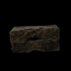 Close-up of Girl Scout Cookies strain hash by VanCity Labs broken into chunky pieces – best hash online Canada, best extracts online Canada, order hash online.